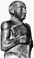 Образец шумерской портретной скульптуры. Статуя молодого Гудеи. Из Лагаша. XXII в. до н.э. Диорит.
