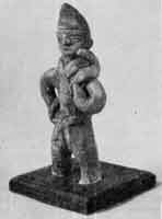 Жрец с серпом. Глиняная статуэтка   из   ханьских погребений (провинция Хэбэи).