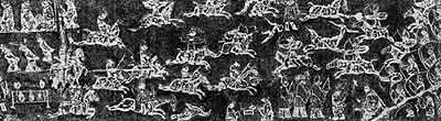 Битва с гуннами и захват пленных. Каменный рельеф из хаыьсной гробницы в провинции Шаньдун. Середина II в. н. э.