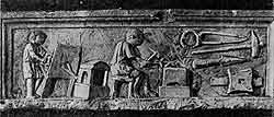 Кузница. Часть рельефа надгробной стелы. II — III вв. н. э. Мрамор.