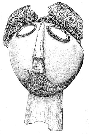 Рис. 45. Маска кельтского бога из области Пиренеев. В отверстия для глаз были первоначально  вставлены эмаль  или  стекло. Бронзовый лист, высота 17,2 см. Музей Тарб, Франция.