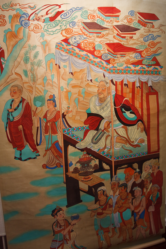 Фрагмент фрески с бодхисаттвой Вималакирти из пещер Могао. Китай, династия Тан: https://ru.wikipedia.org/wiki/Пещеры_Могао#/media/Файл:Vimalakirti_Debates_Manjusri_Dunhuang_Mogao_Caves.jpeg